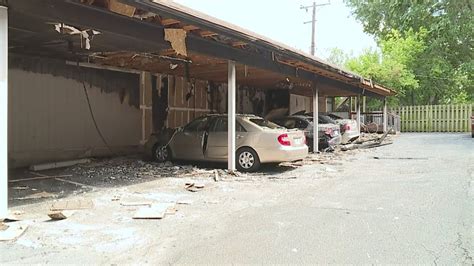 Parked BMW involved in KCFD fire investigation after carport is destroyed